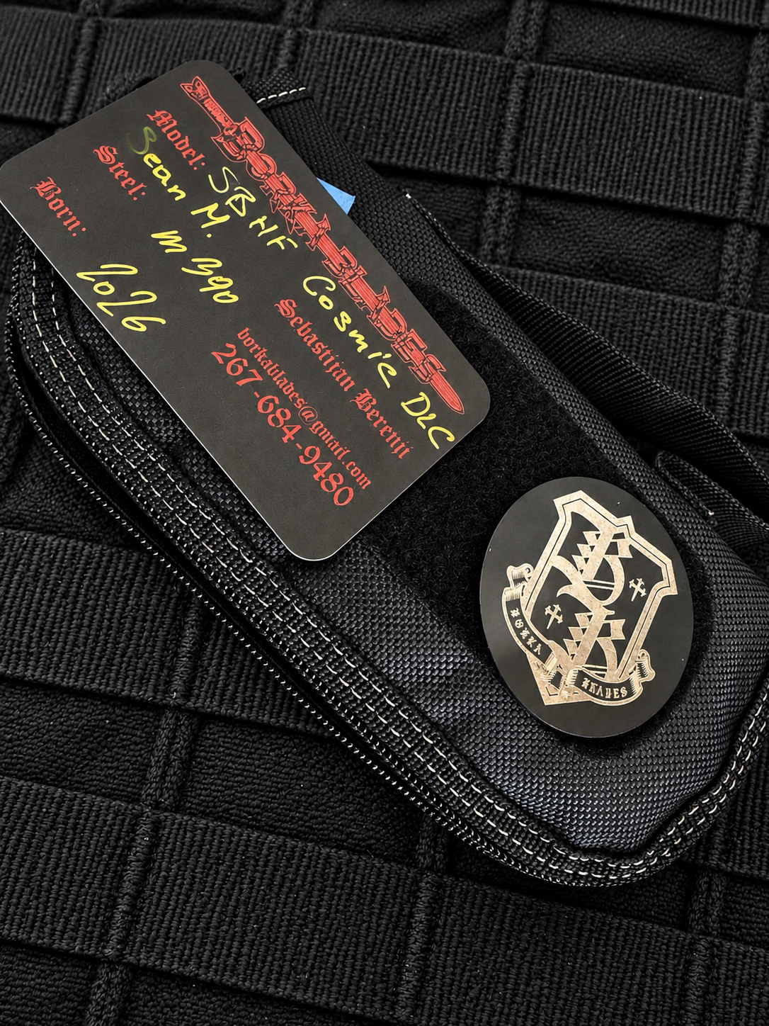 Borka Blades SBHF accessories including black zippered knife pouch, Borka Blades metal logo patch and maker's specification card.