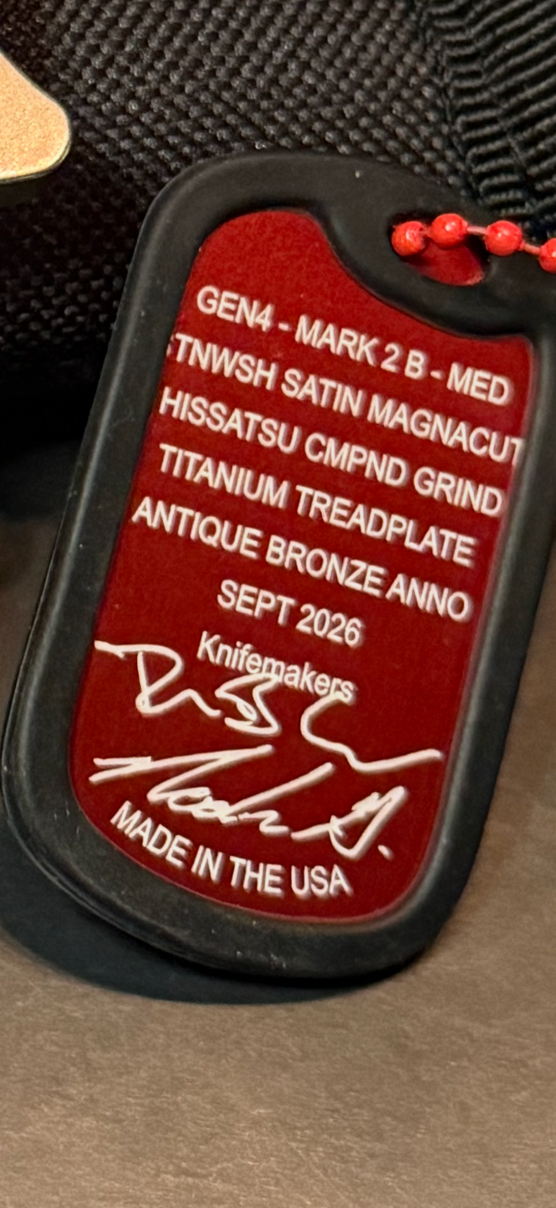 A2D Mark 2 B-MED Gen 4 September 2026 maker tag confirming MagnaCut Hissatsu compound grind and Antique Bronze titanium Treadplate