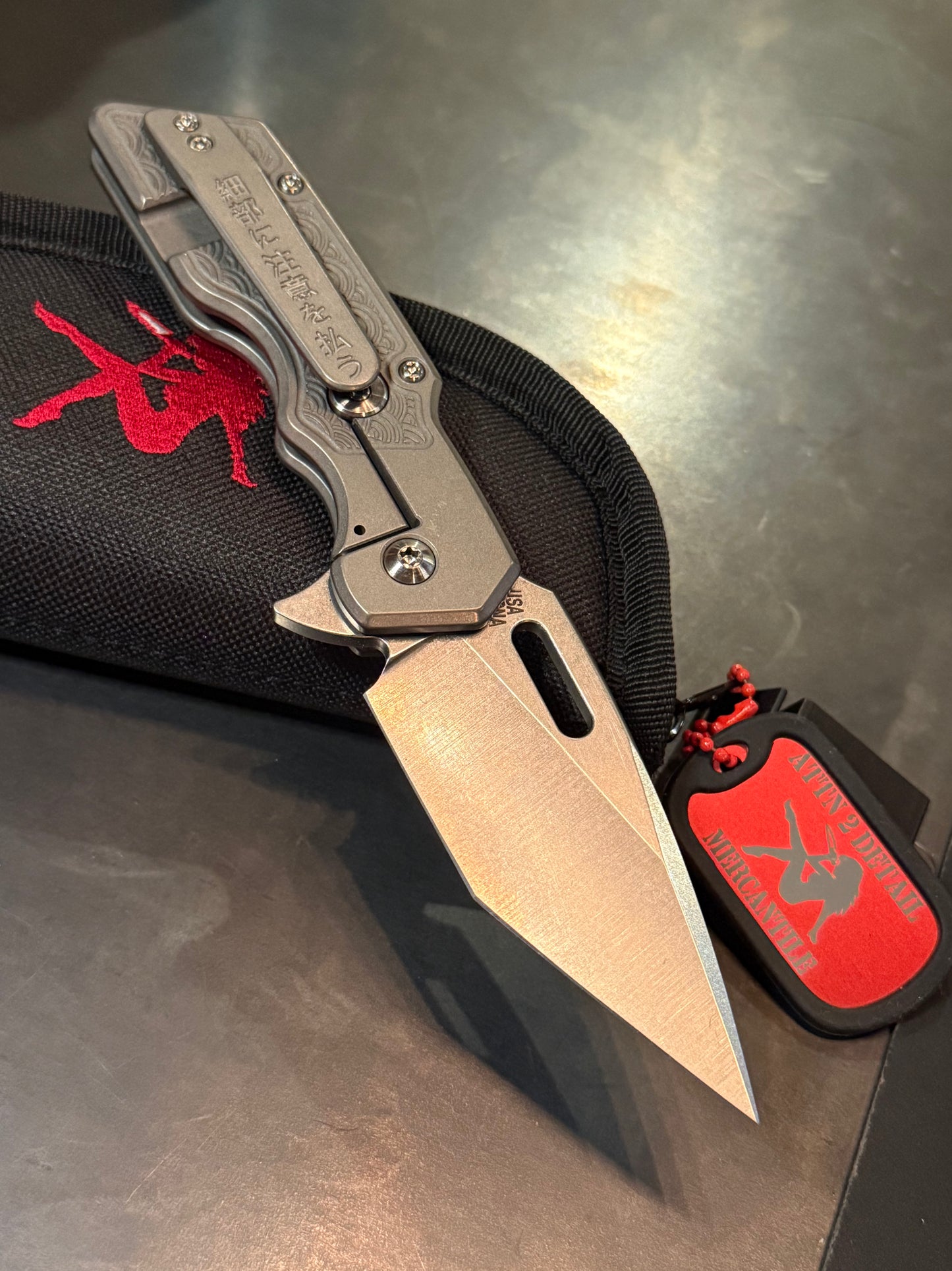 Attention 2 Detail Mercantile Mark 1 MED greywashed titanium frame lock knife with Seigaiha milling and Japanese engraved pocket clip