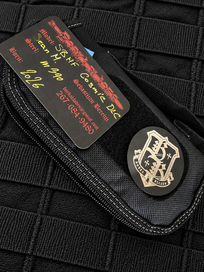 Borka Blades SBHF accessories including black zippered knife pouch, Borka Blades metal logo patch and maker's specification card.