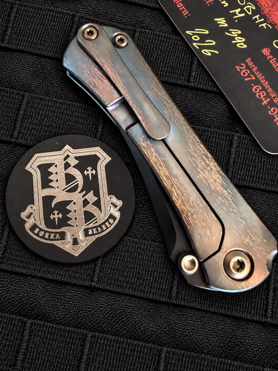 Closed Borka Blades SBHF showing Cosmic DLC titanium frame lock, matching pocket clip, distressed bronze and charcoal finish and custom hardware.