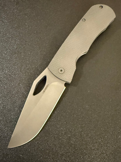McNees Dixon 3.75 MagnaCut folding knife with Diamond milled titanium handle and open blade