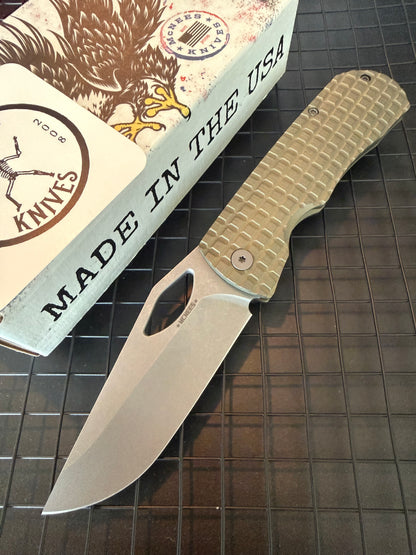 McNees Little Dixon 3.25 folding knife with stonewashed drop point blade and green FRAG milled titanium handle with bronze hardware