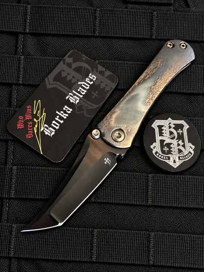 Open, presentation side
Borka Blades SBHF by Sebastijan Berenji and Sean Marfione featuring a hand-ground black DLC M390 blade and Cosmic DLC titanium handle.