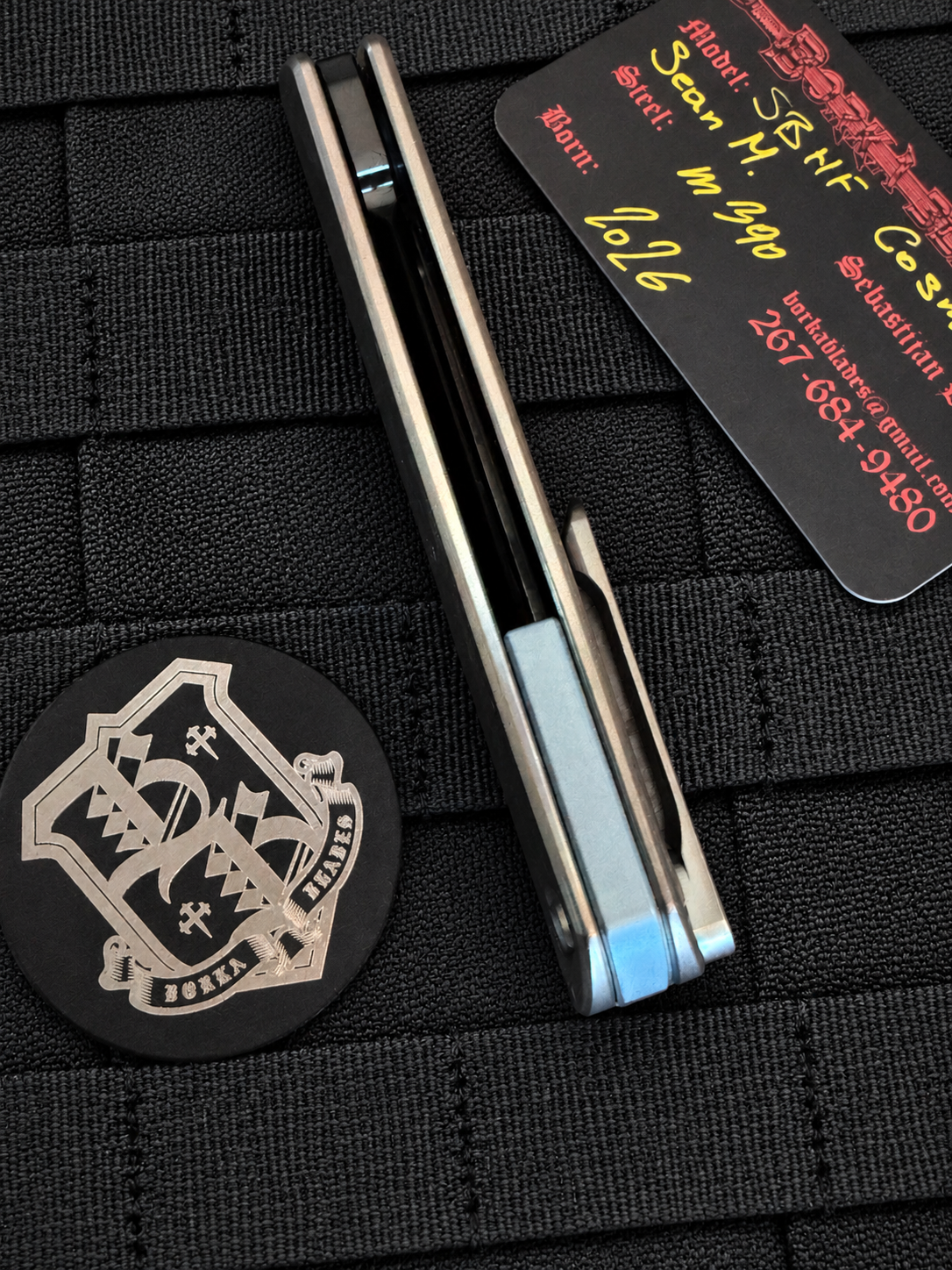 Spine view of Borka Blades SBHF custom folding knife showing full titanium handle construction, Cosmic DLC finish and backspacer.