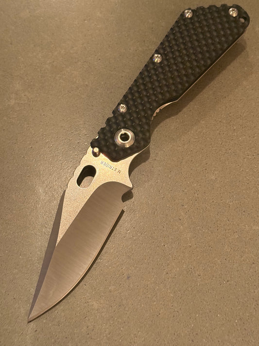 Strider SMF DGG Double Gunner Grip with hand-ground satin Bowie S30V blade and textured black G10 presentation side.