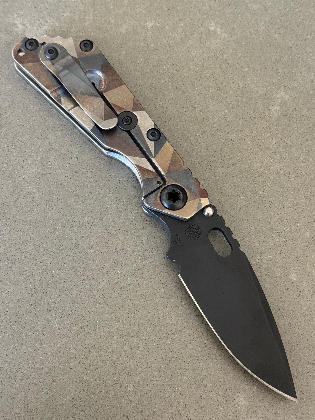 Strider SnG Battleship full titanium Lego handle knife with geometric laser camouflage and black CPM MagnaCut blade