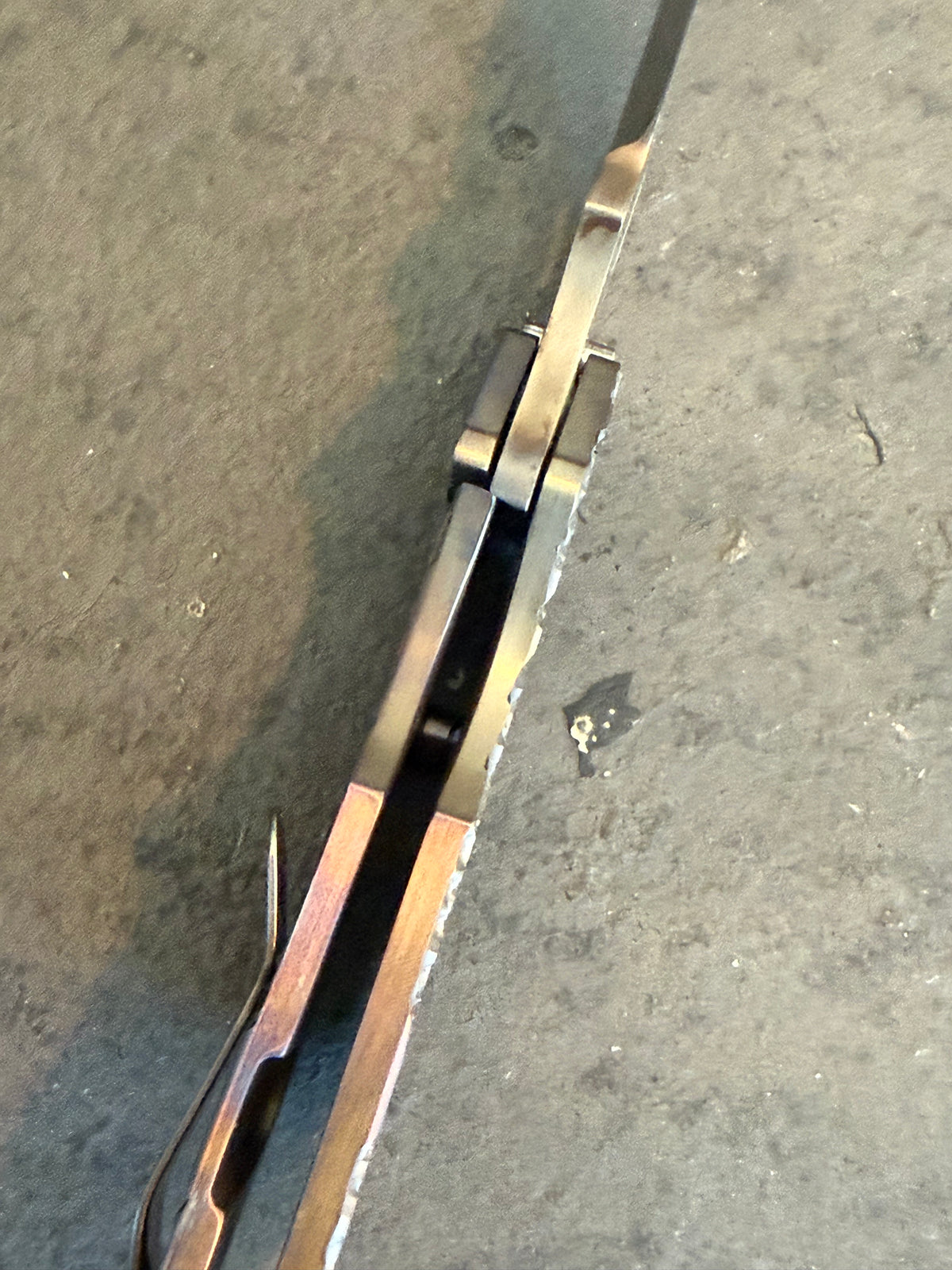 Top view of Duane Dwyer BBN-M Tanto showing PD1 blade thickness, titanium handle construction and open frame.