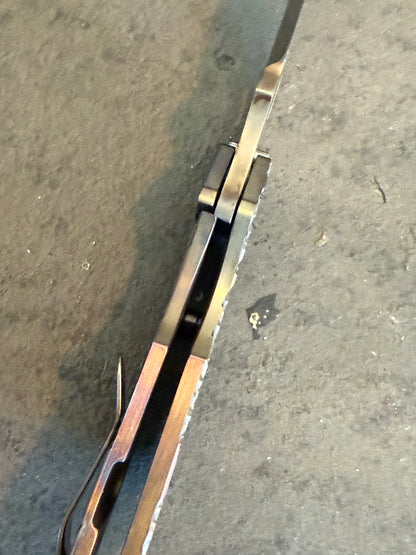 Top view of Duane Dwyer BBN-M Tanto showing PD1 blade thickness, titanium handle construction and open frame.